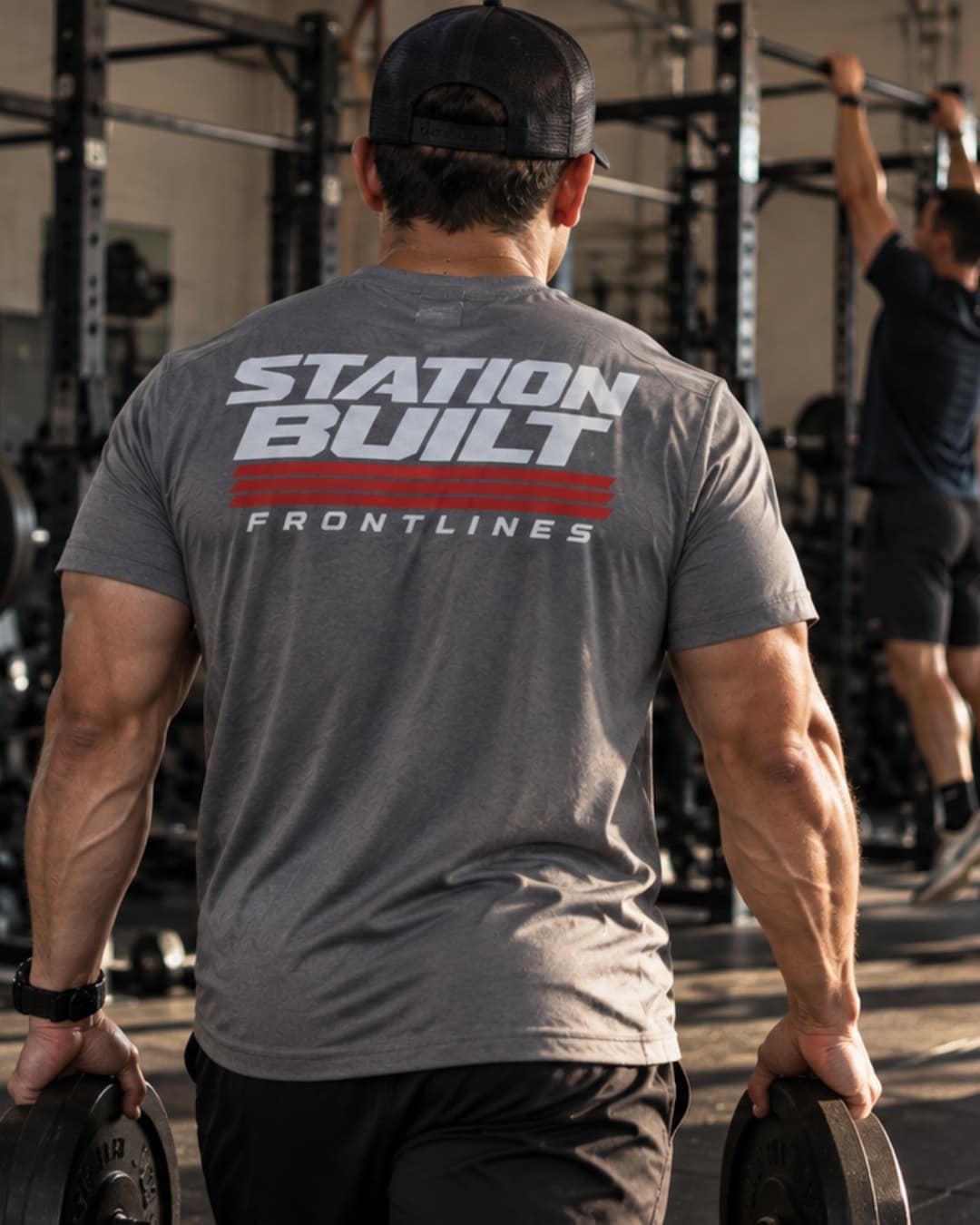 Station Built performance tee during a fire station gym session