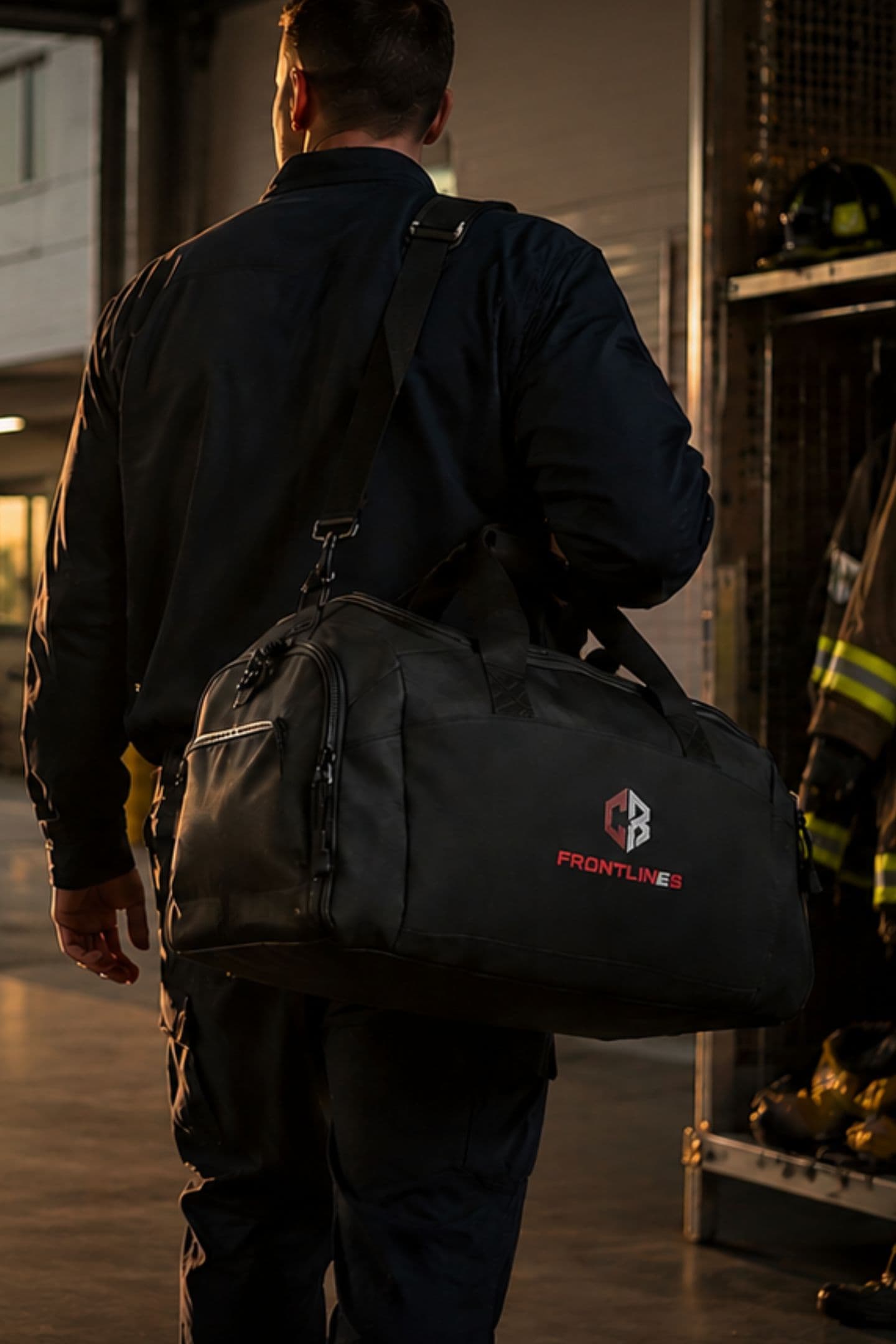 Responder carrying SHIFT gear into the station